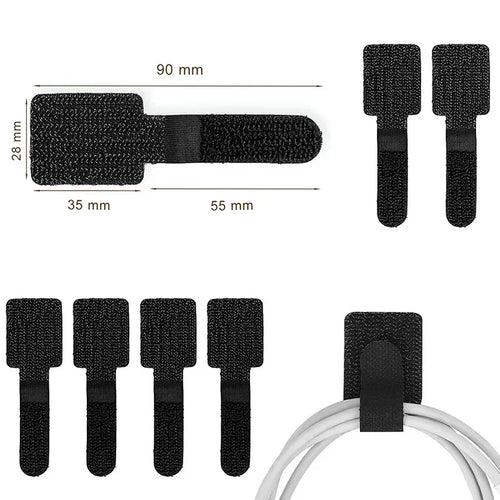 Reusable adhesive cable management straps holding desk cables
