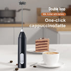 USB-C rechargeable milk frother whisking foam in a cup
